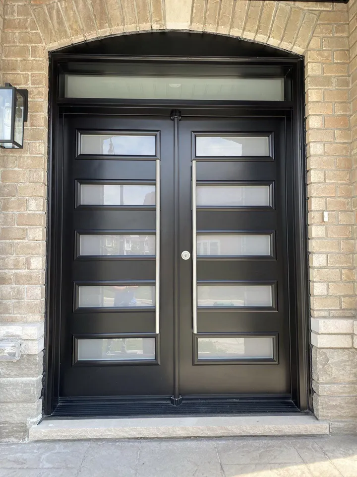 Black double entry doors with glass panels